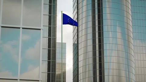 European Union Flag 3D Render Animation on Pole with City Buildings Video stock 332879642
