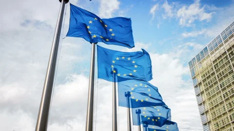 European Union flags waving in front of European Commission. Brussels, Belgium Stock Footage