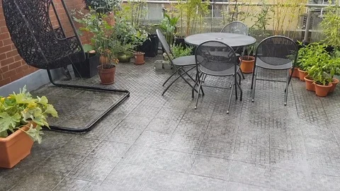 European Urban Terrace during a very wet summer day. Stock Footage