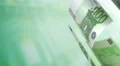 Euros Looped Motion Money Background. Depth of field. Slow Gentle Seamless Loop. 4k or 4k+ Resolution