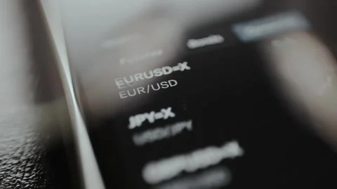 EURUSD currency pair displayed within a trading app interface, view through Stock Footage 329772266