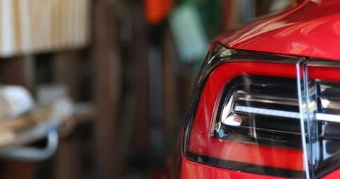 EV Automatic Charge Port Door Plug In in Garage Stock Footage 94049075