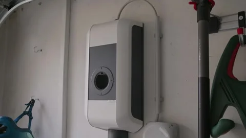 EV Wallbox Firmware Update: Inserting USB Drive and Pressing Reset Button 動画素材 331162917