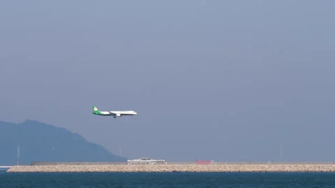 Eva Air Airbus A321 on Final Landing Approach at Hong Kong Airport Stock Footage 335188295