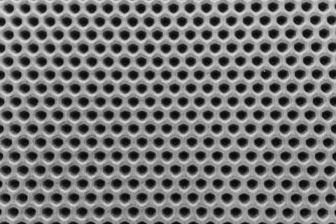 Eva rug with a pattern of small holes on a flat surface Stock Photos