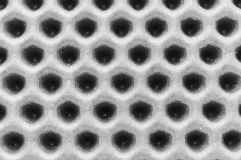 Eva rug shows detailed pattern of hexagonal shapes on a surface Stock Photos