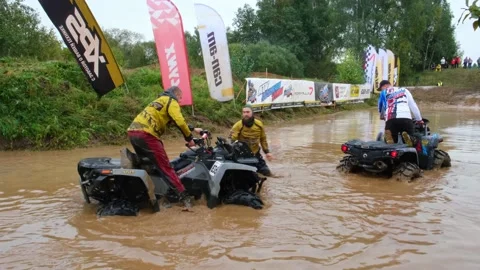 Evacuation of an ATV on a winch in a puddle. Stock Footage 189032817