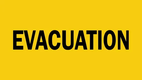 Evacuation - Black text on a yellow background with animation Stock Footage 297899463