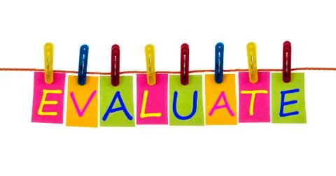 Evaluate word on laundry hook Stock Photos