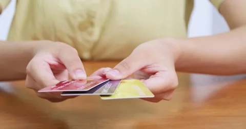 Evaluating credit options financial setting image of hands personal finance Stock Footage 313934519