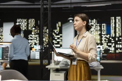 Evaluating operational efficiency, laptop and business administrator in office Stock Photos