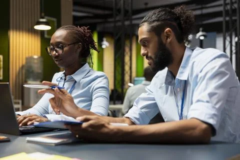 Evaluating staff performance, task completion and manager in office Stock Photos