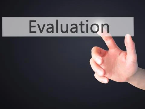 Evaluation - Hand pressing a button on blurred background concept on visual s Stock Photos