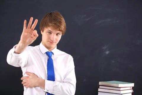 Evaluation of the test, the student shows on their fingers Stock Photos