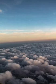 Evening above the clouds, an ocean of soft fluffy Stockfoto's