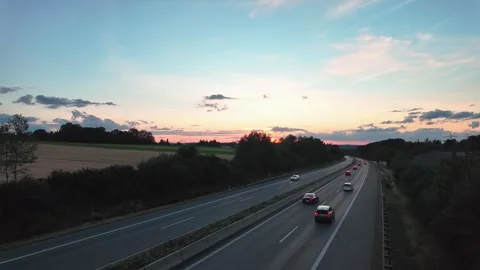 Evening autobahn traffic at sunset Stock Footage 338306490