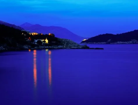 Evening at the bay with a view of the islands, mountains, and the Mediterrane Stock Photos