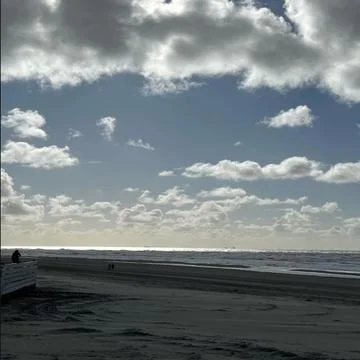 An Evening at the beach nature sky clouds water sand with peace 스톡 사진