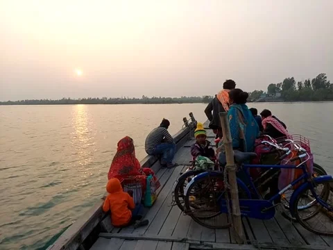 In the evening, boats are going from one island to another in the Sundarbans. Video stock 188229865