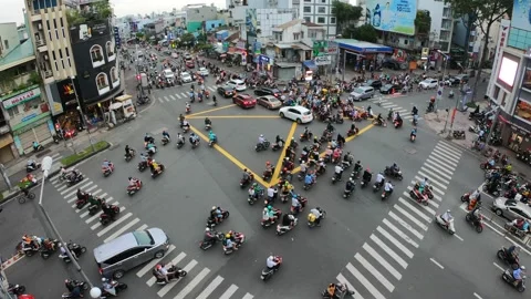 Evening busy traffic intersection in Vietnam Stock-Footage 154797604