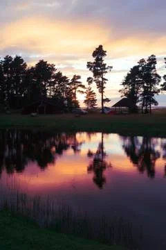 Evening in the camping with reflection in the lake Stock Photos