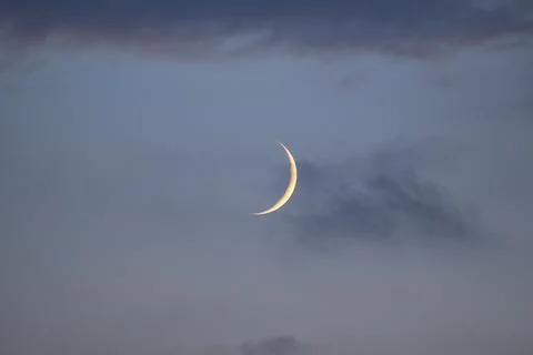 Evening centered view of crescent Moon seen from Ticknock Forest, Dublin Stock Photos