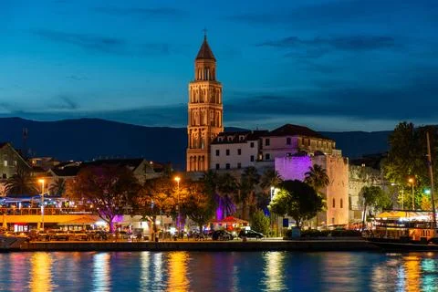 Evening city of Split in Croatia, reflection of the lights of the night city. Stock Photos