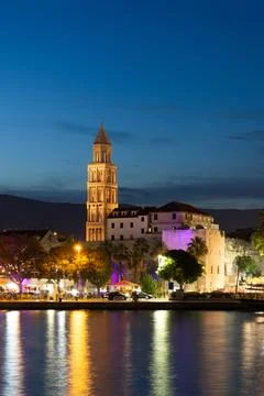Evening city of Split in Croatia, reflection of the lights of the night city. Stock Photos