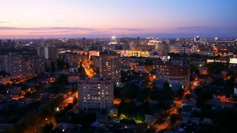 Evening cityscape after sunset. Modern city with buildings, roads and car Stock Footage 110876134