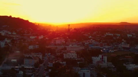 Evening cityscape against the backdrop of a warm sunset, Dominican Republic. Stock Footage 266158314