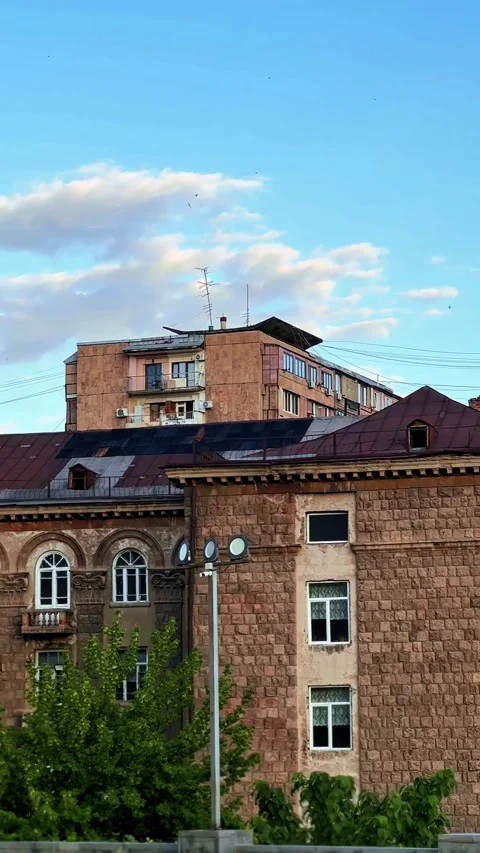 Evening cityscape with moon over old buildings, Yerevan, Armenia Video stock 318362741