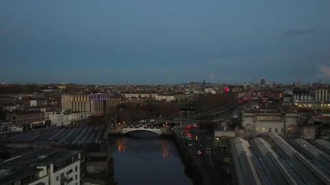 Evening Cityscape with River and Bridge in Dublin Stock Footage 332444493