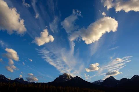 Evening clouds in the canadian rockies Stock Photos