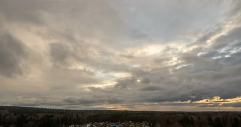 Evening clouds fast moving away, rolling dark sunset clouds 4k black gray white Stock Footage 132325821