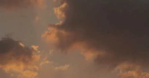 Evening Clouds hand held shot Stock Footage 157169337