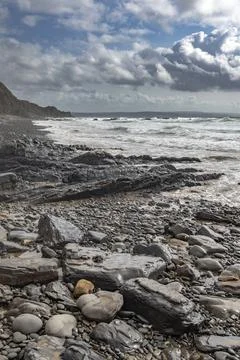 Evening clouds at high tide on Cornish coast Foto stock