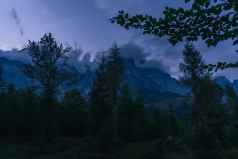 Evening clouds over Austrian Alps mountain landscape Stock Photos