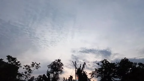 Evening clouds over the city Stock Footage 221415920