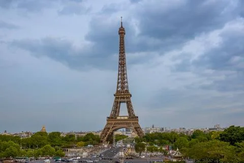 Evening Clouds over the Eiffel Tower France. Paris. Summer cloudy evening.... Stock Photos