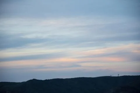 Evening clouds over horizon Stock Photos