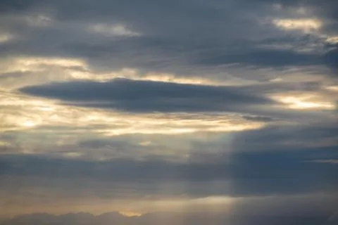 Evening clouds over sea Stock Photos