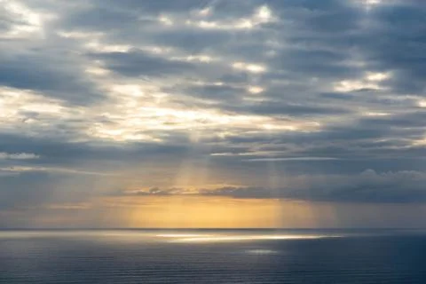 Evening clouds over sea Stock Photos