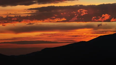 Evening clouds with sun underneath them during sunseat. Stock Footage 295867976