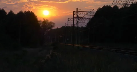 Evening Clouds Sunset over a Railroad Stock Footage 141150248