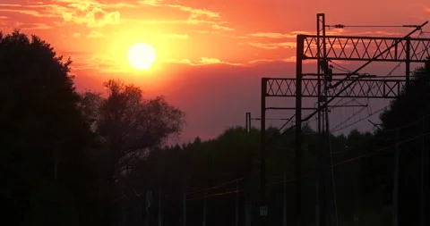 Evening Clouds Sunset over a Railroad Stock Footage 141150750