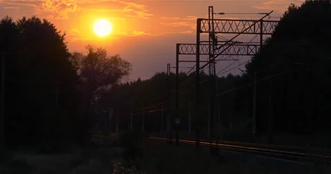 Evening Clouds Sunset over a Railroad Stock Footage 141151618
