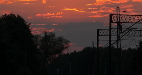 Evening Clouds Sunset over a Railroad Timelapse Stock Footage 141160215