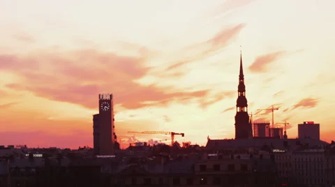 Evening clouds time lapse over a city skyline Stock Footage 42425735