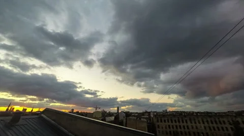 Evening clouds time lapse over a city skyline Stock-Footage 42518816