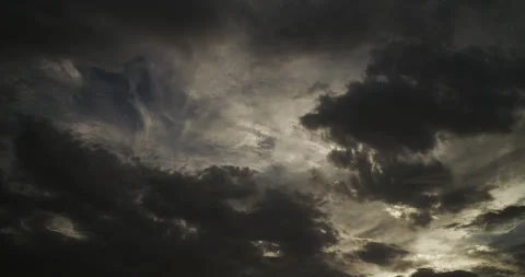 Evening cloudscape with atmospheric interplay between light and shadow. Stock Footage 344877652